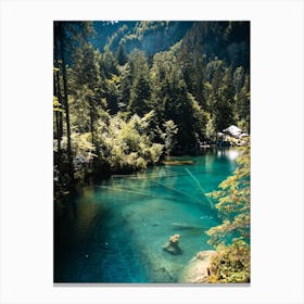 Bluelake Swiss with a statue in it Canvas Print
