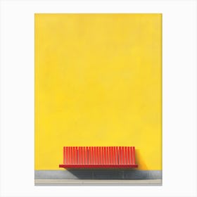 Bench Against A Yellow Wall Canvas Print