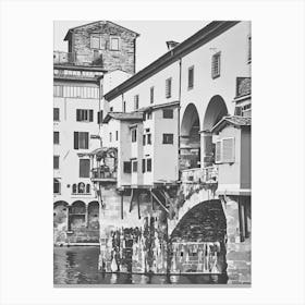 Ponte Vecchio Over the Arno River. A black-and-white depiction of Florence’s iconic Ponte Vecchio bridge, stretching over the Arno River. This historic bridge, adorned with small shops and classic Italian architecture, embodies the timeless beauty of Florence. 1 Canvas Print