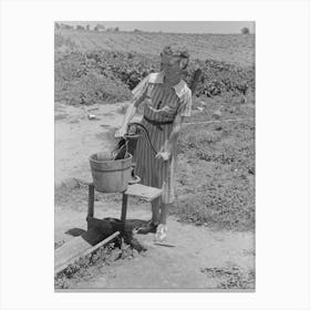 Daughter Of Sharecropper Pumping Water, New Madrid County, Missouri By Russell Lee Canvas Print