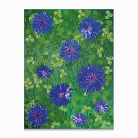 Flowers On The Grass. Blue Cornflowers On Green Grass With Green Clover Leaves Canvas Print