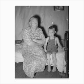 Woman Tenant Farmer With Her Grandson,Her Husband Is Dead And She Is Farming With The Help Of Three Near Canvas Print