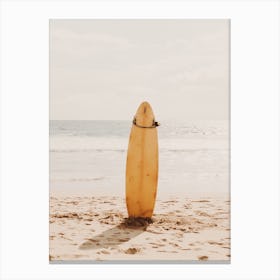 Yellow Surfboard On Beach Canvas Print