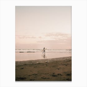 Surfer On Sunset Beach Canvas Print