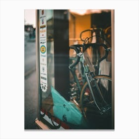 Bicycle In A Shop Window Canvas Print