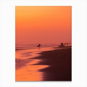 Surfer During Vibrant Sunset Canvas Print