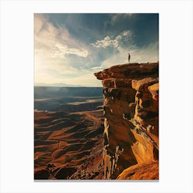 Man Standing On A Cliff Canvas Print