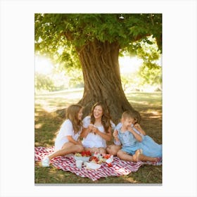 Family Of Four Laughing And Sharing Ice Cream Under A Large Oak Tree Picnic Blanket Spread With A (1) Leinwandbild