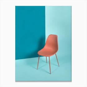 Chair Against A Blue Wall Canvas Print