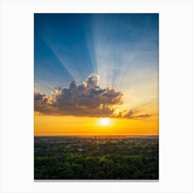 An Idyllic Sunset Unfolds In Heaven Where Beautiful Sun Rays Pierce Through The Clouds Creating A P (1) Canvas Print