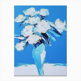 White Roses In A Blue Vase Canvas Print