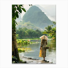 Woman Walks Along A River Canvas Print