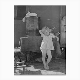 Child Of Migrant Family In Front Of Household Goods Of Trailer Home, Weslaco, Texas By Russell Lee Canvas Print