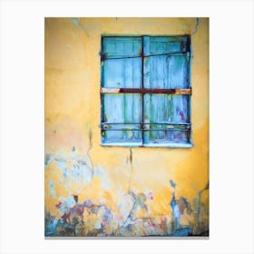 Blue Shutters And Yellow Wall Canvas Print