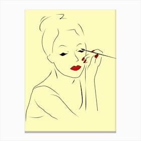 Woman doing makeup Canvas Print