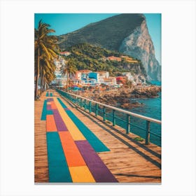 A Boardwalk With Colorful Painted Colors By The Ocean Canvas Print