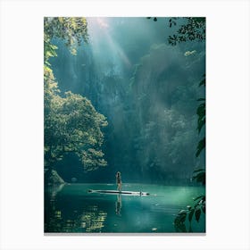 Woman Paddles In The Water Canvas Print