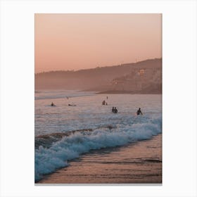Surfers during sunset in the surftown of Taghazout, Morocco Canvas Print