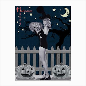 Pin Up Witch Is Posing With Pumpkin By The Fence Canvas Print