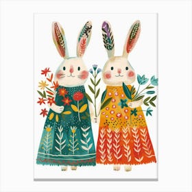 Two Bunnies Holding Flowers 1 Canvas Print