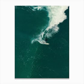 Aerial View Of A Surfer Riding A Wave Canvas Print