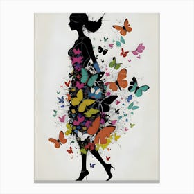 The men's silhouette is slender and minimalist, with soft and elegant lines. Her dress is made up of multicolored butterflies that seem to dance around her, creating an ethereal and delicate effect. The butterflies vary in size and hue, adding a touch of dynamism and joy to the image. The woman appears to be in harmony with nature, symbolized by the butterflies that adorn her dress. Canvas Print
