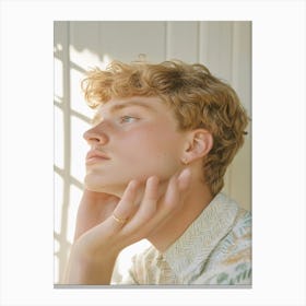 Young Man Leaning Against Window Canvas Print