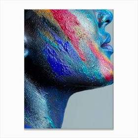 Woman With Colorful Paint On Her Face Canvas Print