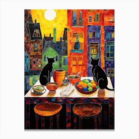 Two Cats On A Kitchen Table With An Old City Scape In The Background Canvas Print