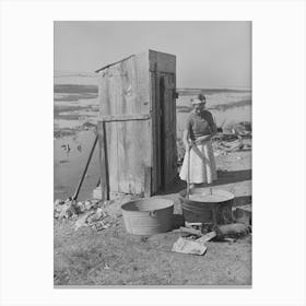 Daughter Of Roofer Washing Clothes In Front Of Family S Tent Home, Corpus Christi, Texas By Russell Lee Canvas Print