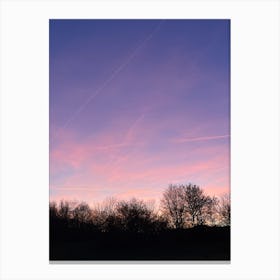 Sunset With Contrails Canvas Print