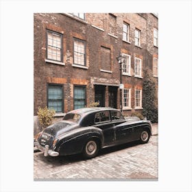 London, England I Antique car on a Shoreditch street with retro vintage aesthetic brick facades with a street photography of British minimalist geometric architecture with a moody ambience Leinwandbild