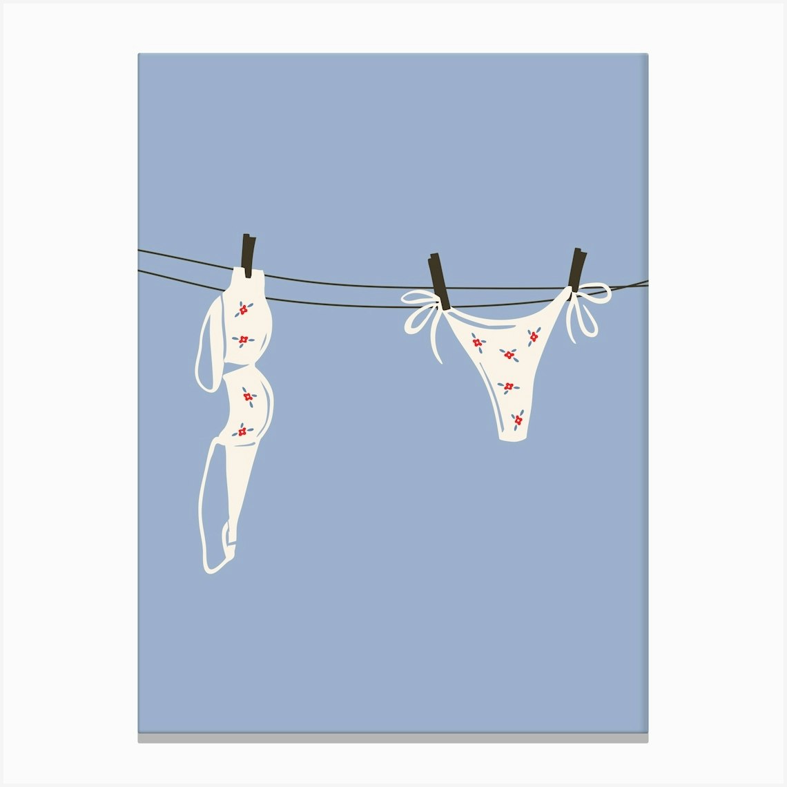 Blue Bikini Hanging On Clothesline Canvas Print by House of Saturn