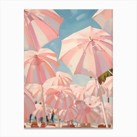 Pink Umbrellas On The Beach Canvas Print