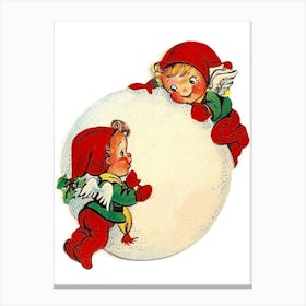 Two Elfs Making A Big Snowball Canvas Print