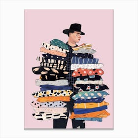 Man With A Stack Of Clothes Canvas Print