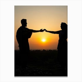 Silhouette Of A Couple At Sunset Canvas Print