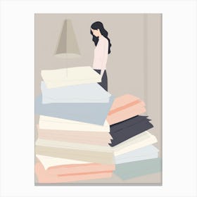 Woman Standing In Front Of A Pile Of Sheets Canvas Print