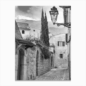Narrow alley at Soller, old mediterranean town in Tramuntana mountains on Mallorca, Spain Canvas Print