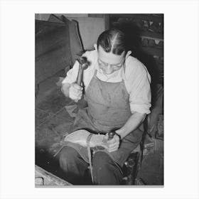 Bootmaker Pounding Wooden Peg Into Sole Of Boot In Building Up Sole With Several Pieces Of Leather Canvas Print