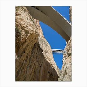 Bridges and rock faces of Mascarat Canyon Canvas Print