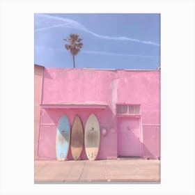 Surfboards In Front Of A Pink Building Canvas Print
