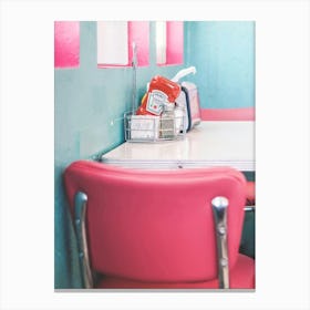 Route 66, USA I Interior of an American diner 50s retro vintage with pastel pink and blue aesthetic in the American countryside in Arizona or California captured as a lifestyle moment photography at the table Canvas Print