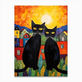 Two Black Cats At Sunrise In Front Of A Town Canvas Print