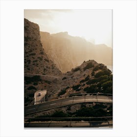 Formentor Mallorca - Car in sunset over the mountain roads of this beautiful mountain area Canvas Print