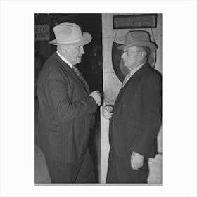 Cattlemen Talking In The Hotel Lobby During The San Angelo Fat Stock Show, San Angelo, Texas By Russell Lee Canvas Print