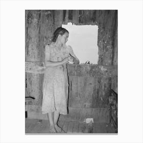 Daughter Of Agricultural Day Laborer Looking Out The Unshuttered Window Of The Desolate Shack Which Was Her Ho Canvas Print
