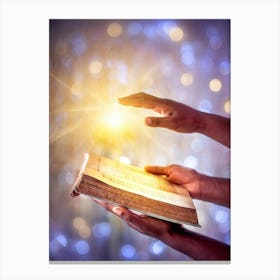 A Hand Gently Holding Open A Holy Bible To Highlight A Passage Surrounded By A Soft Glow That Sugge (4) Canvas Print