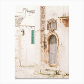 Puglia, Italy I Deserted street with Italian Baroque architecture and vintage retro door photography in damaged condition with summer pastel aesthetic of la dolce vita in a countryside village in south Canvas Print