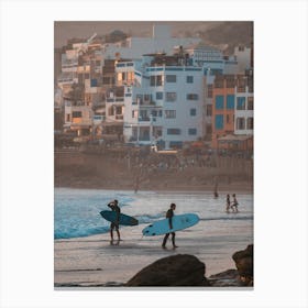 Surfers on the beach of Morocco | Streetphotography Canvas Print